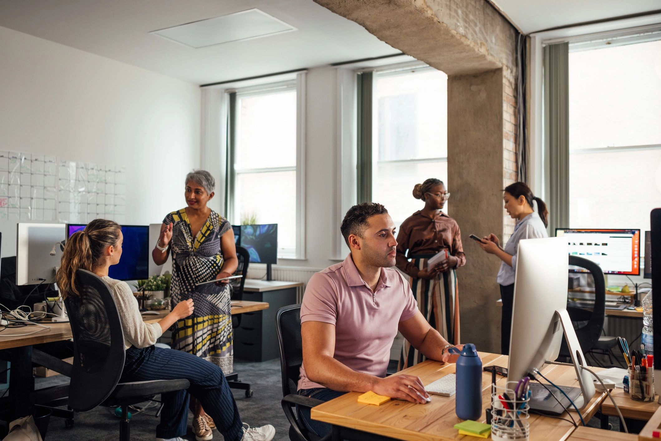 Professional office team representing satisfied clients
