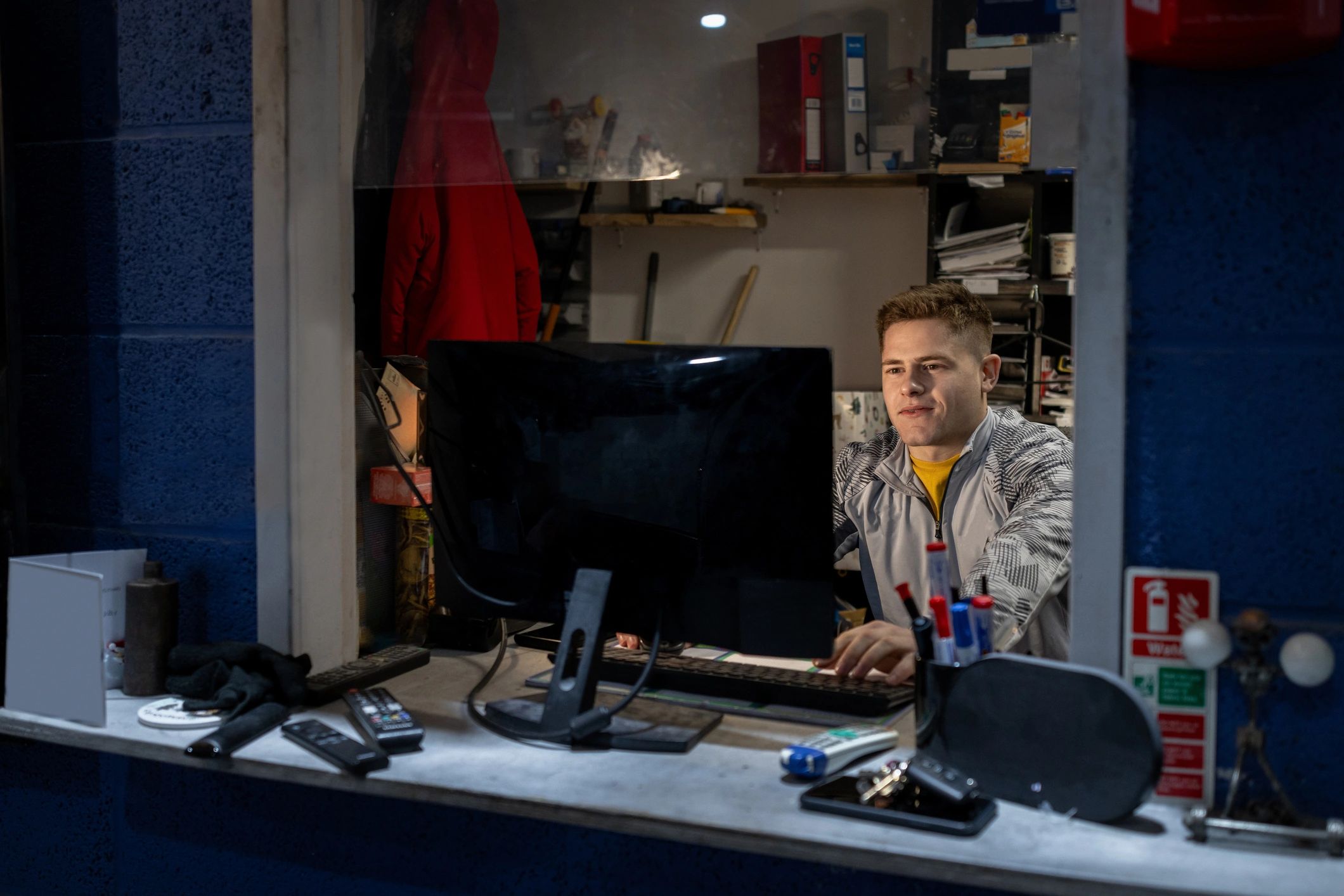 Technician working at a computer in an office